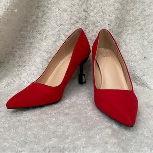 Red faux suede pumps with jewel detail on heel